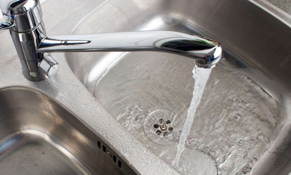 Give Your Sink A Thorough Rinse to clean kitchen sink drain