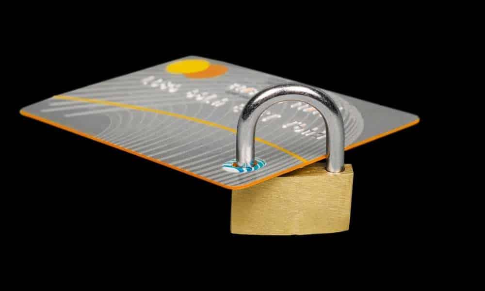 A Credit Card On A Spring Lock To Unlock A Bedroom Door From The Outside