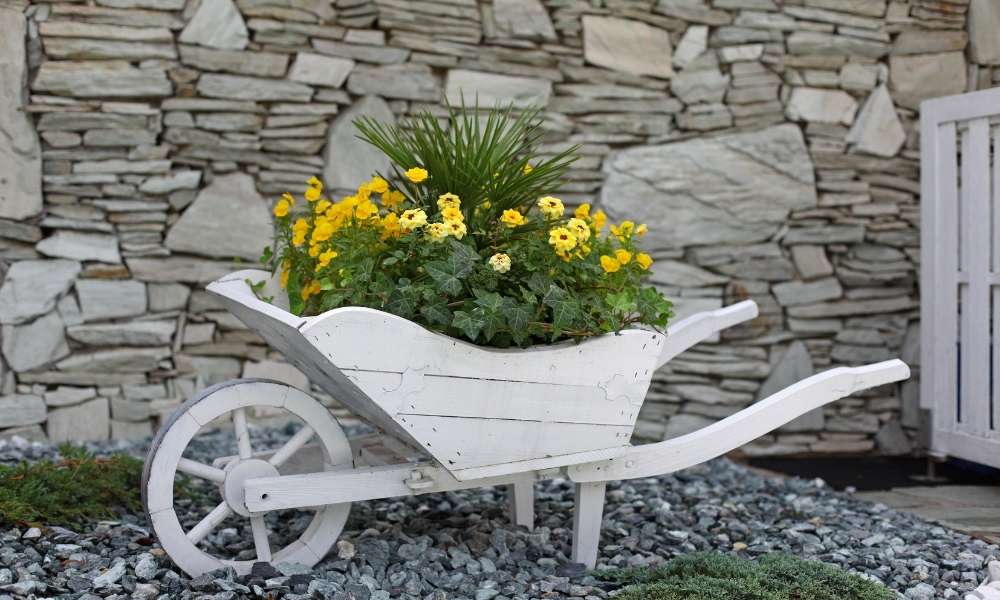 Flower Bed with Wheelbarrow Planter