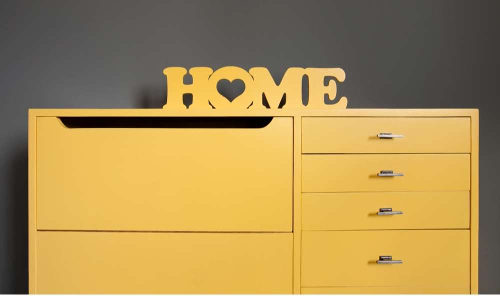 Dresser In Grey and yellow bedroom