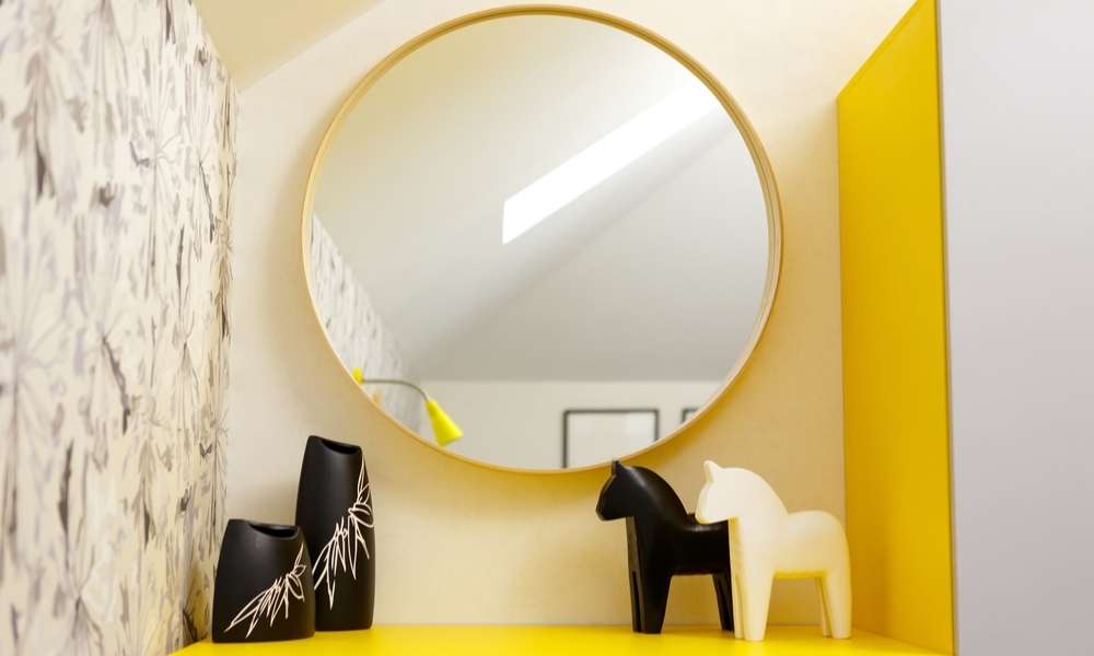 Mirror In Grey and yellow bedroom