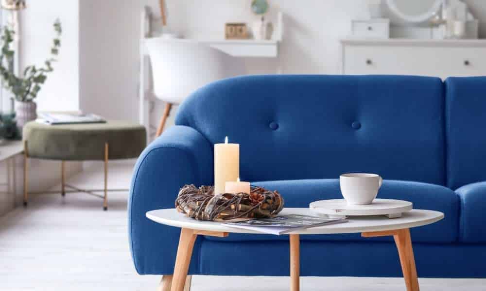 Branch Candles In Blue Sofa Living Room